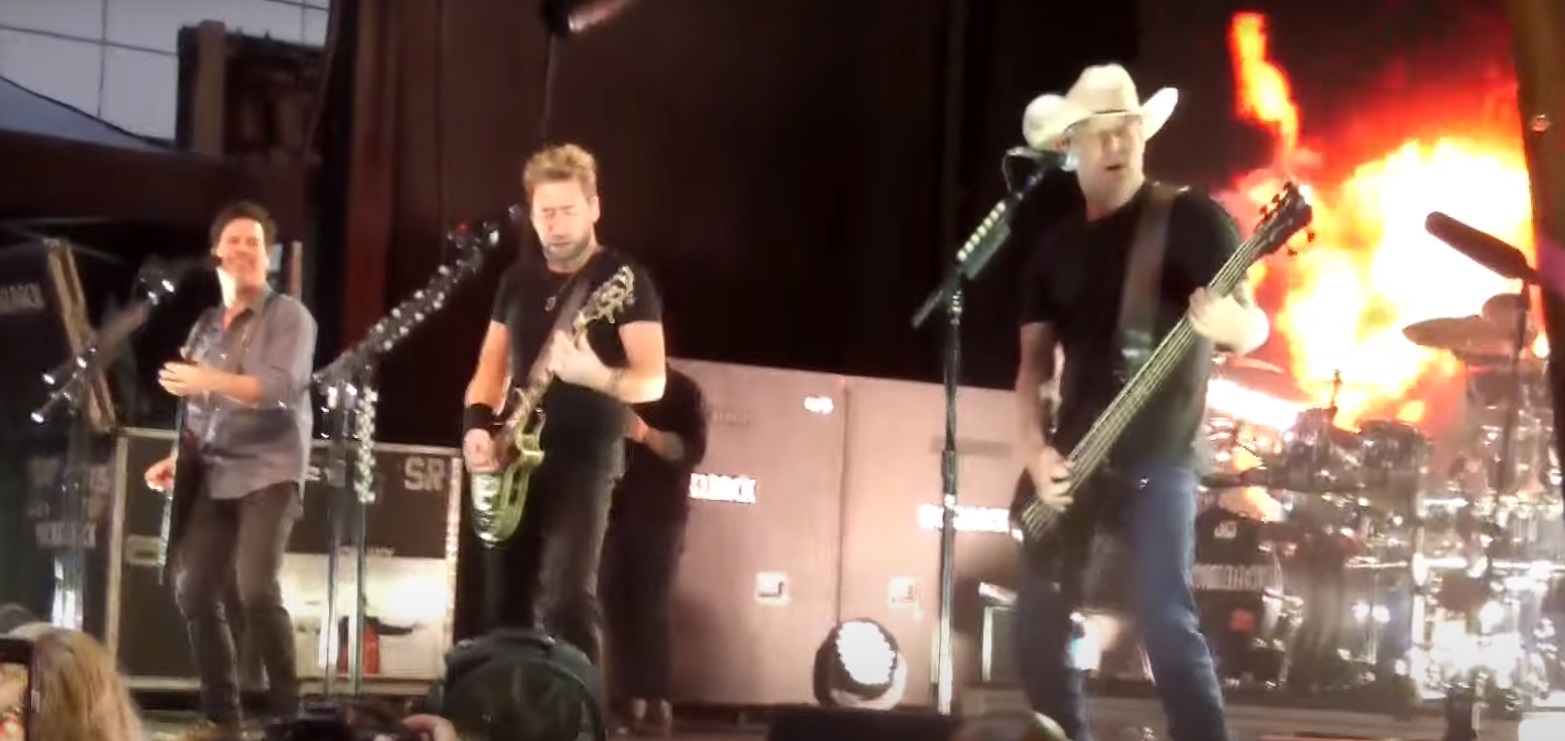 Nickelback performing live on stage