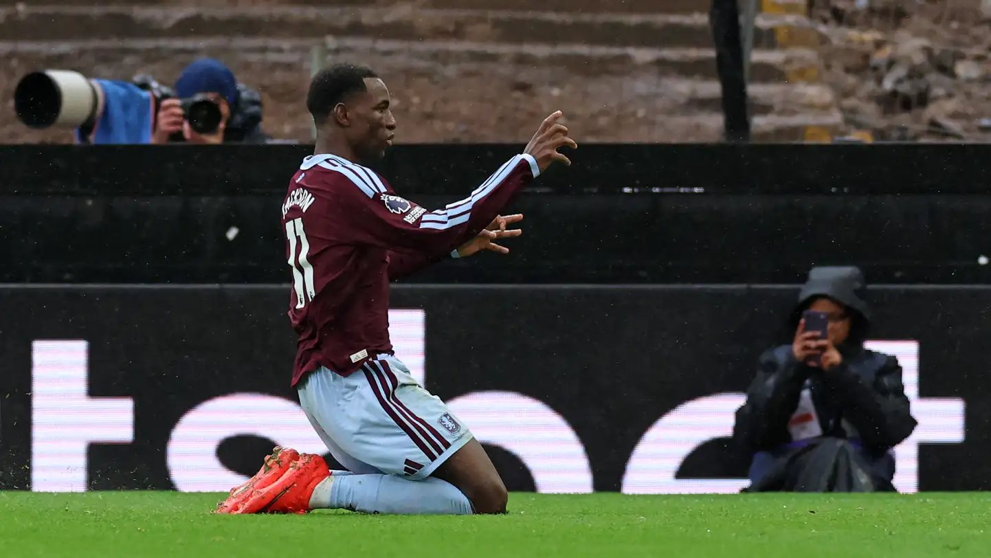 Nicolas Jackson's knee-slide celebration in Aston Villa's No. 11 shirt at Villa Park after scoring against Manchester City, October 24, 2026 — the owner's own photo