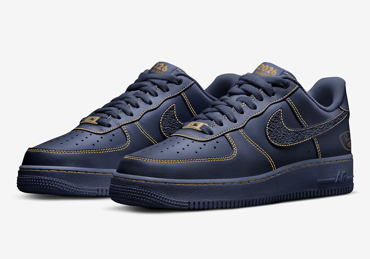 Pair view of the Brewers Air Force 1 '07 showing the 2026 tongue branding and the gold MLB lace dubrae