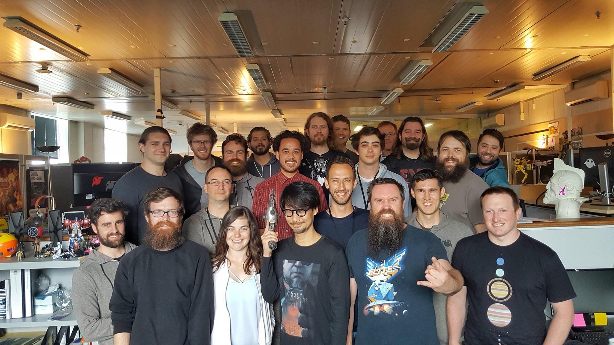 Game developers at work in a studio office