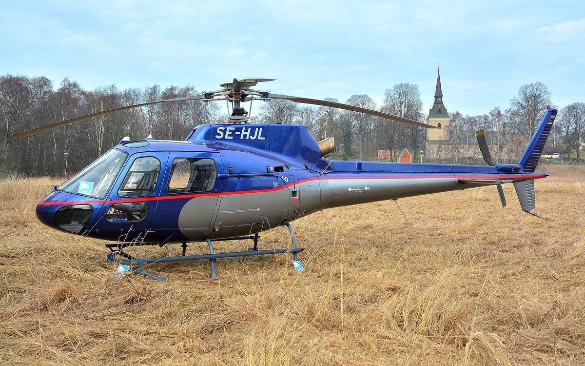 An Airbus H125/AS350 Ecureuil helicopter in profile.