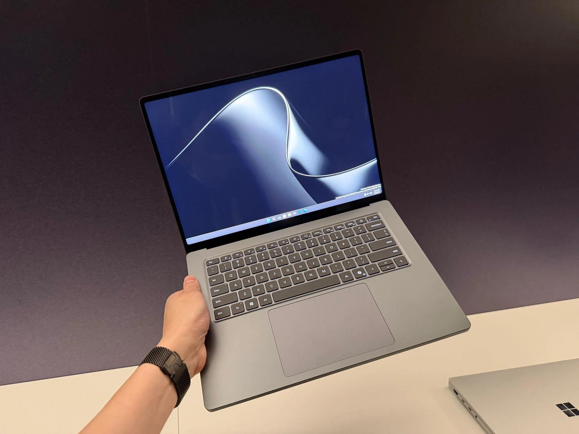 RTX Spark-powered laptop held up on display