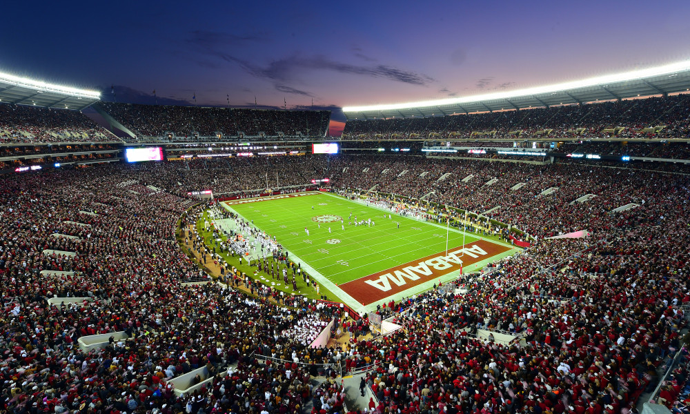 Bryant-Denny Stadium at night — Georgia and Alabama were still battling in Tuscaloosa when this story was filed.
