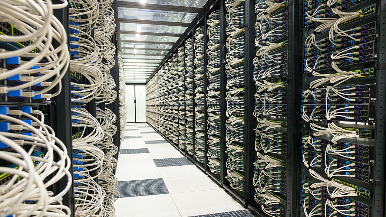Aisle of servers inside a data center.