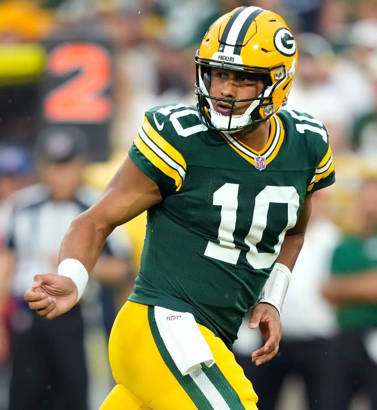 Jordan Love drops back to pass for the Green Bay Packers