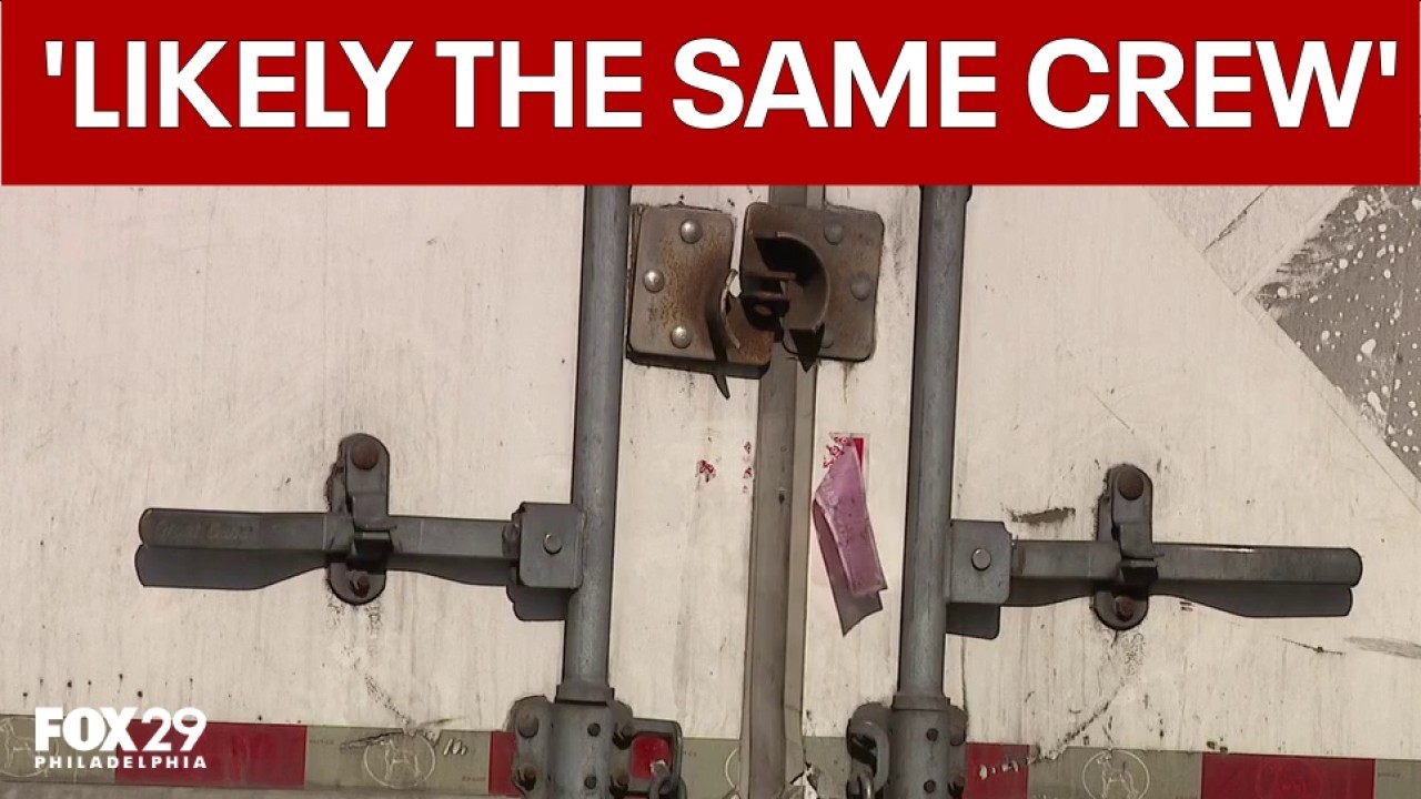Close-up of a trailer's rear-door latch and seal hardware cut by cargo thieves, from FOX 29's coverage of the Philadelphia thefts.