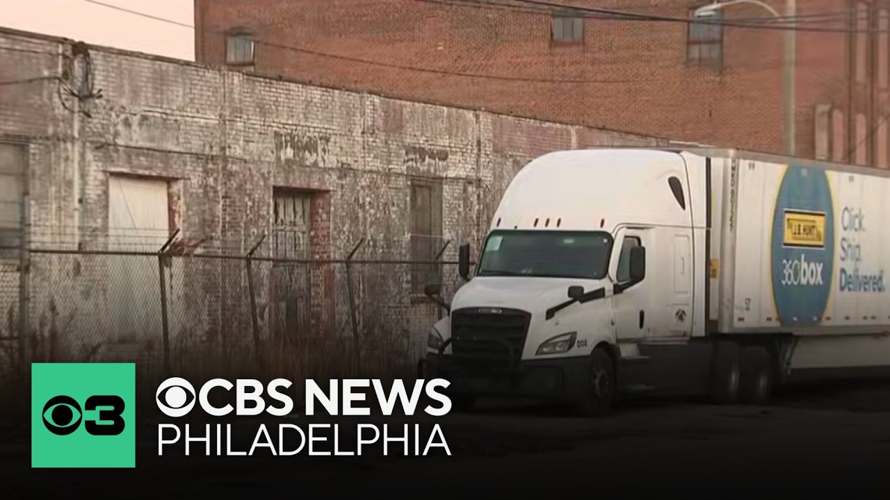 A white tractor-trailer parked at an industrial lot in Philadelphia, the kind of overnight-parked rig targeted in the month's cargo thefts.