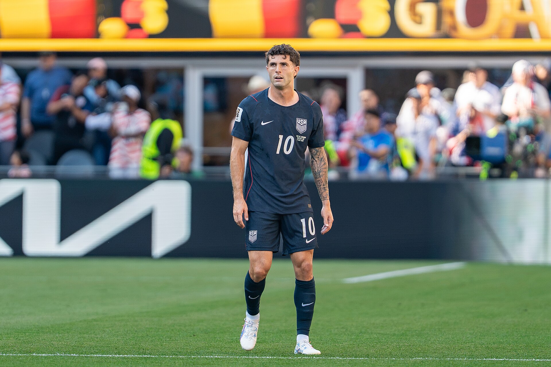 Christian Pulisic in the United States' navy No. 10 kit during a match against Belgium