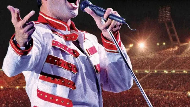 Key art for Queen's 'Hungarian Rhapsody: Live in Budapest' concert film, showing Freddie Mercury on stage at the 1986 Népstadion concert