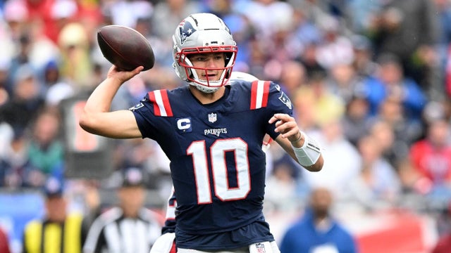 Patriots quarterback Drake Maye throws a pass