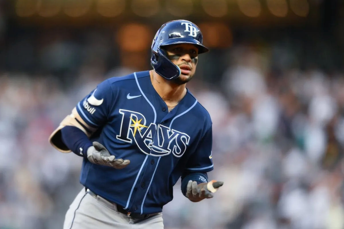 A Tampa Bay Rays runner in navy — the AL’s best record carried into October