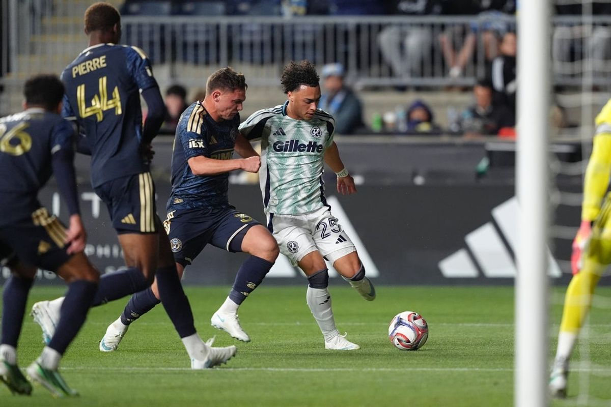 New England’s Peyton Miller controls the ball against Philadelphia at Subaru Park