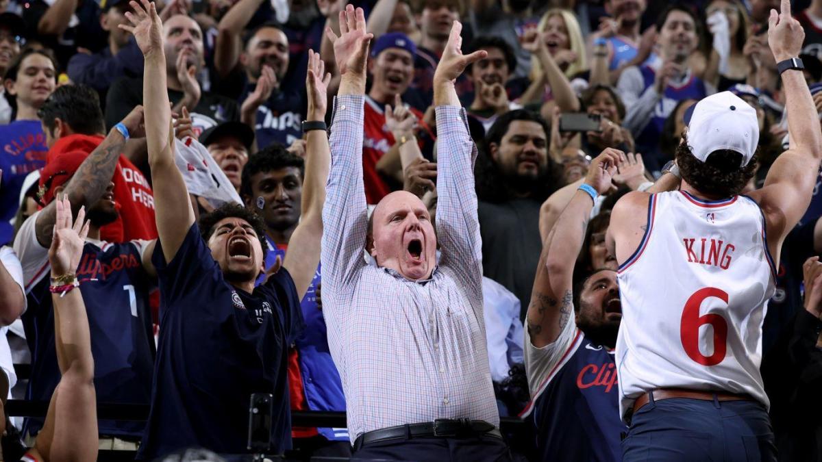 Steve Ballmer celebrates with fans in The Wall during the first regular-season game at Intuit Dome, October 23, 2024