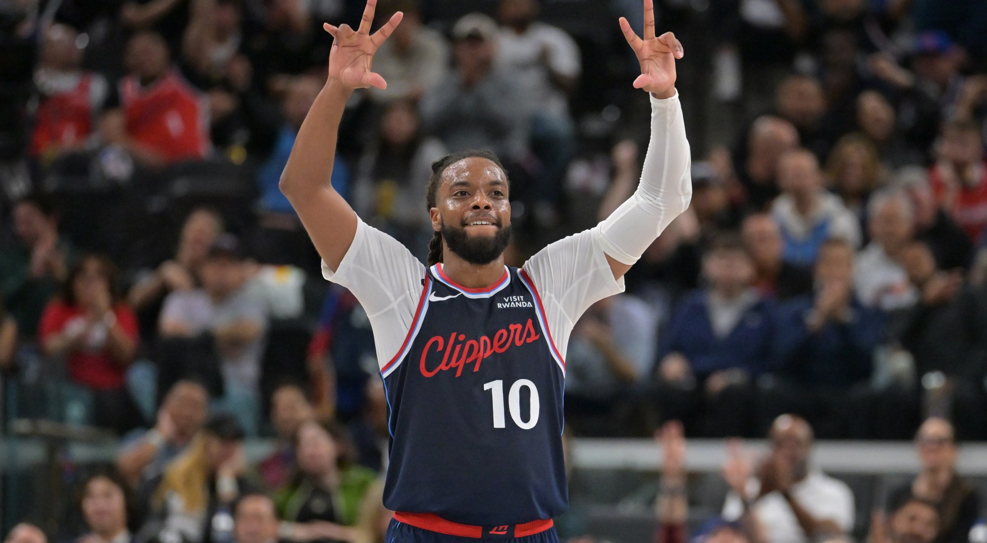 Darius Garland of the Los Angeles Clippers reacts after making a 3-point basket against the Sacramento Kings during the second half at Intuit Dome in Inglewood, California, October 21, 2026