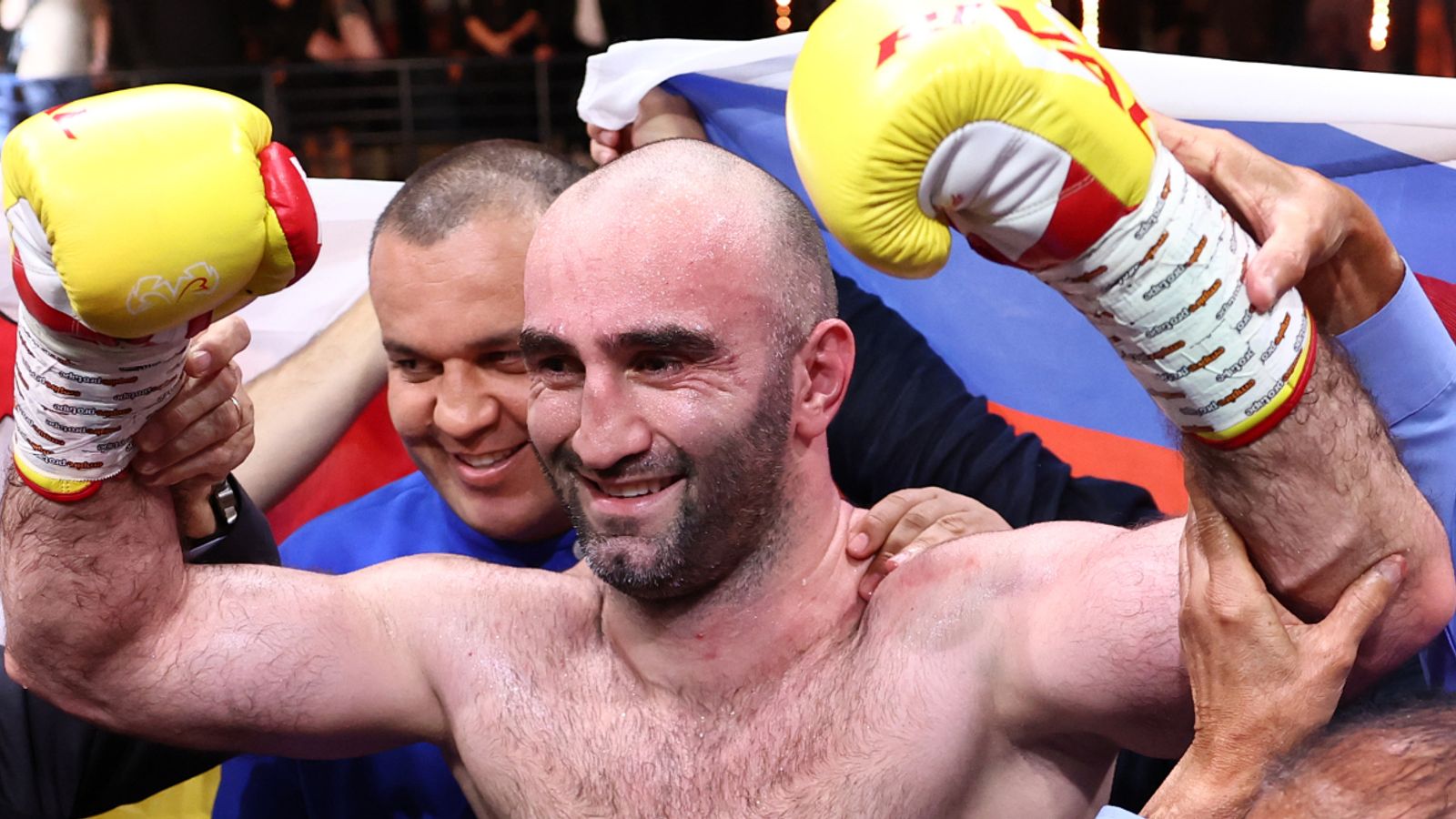 Murat Gassiev celebrates a career-defining victory — the feeling awaiting whoever leaves Wintrust Arena as the new WBA lightweight champion.