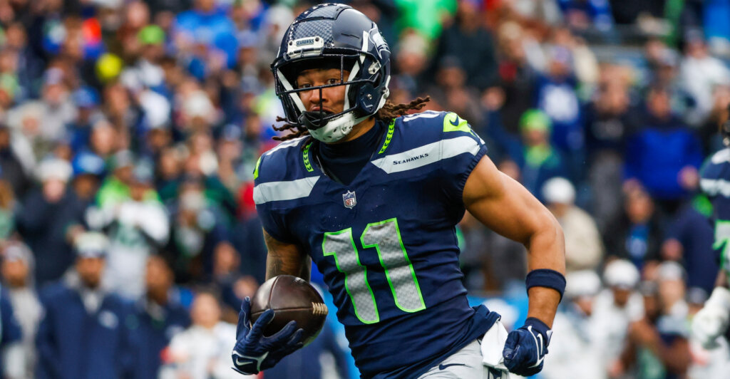Seattle Seahawks wide receiver Jaxon Smith-Njigba (11) in the navy home uniform.