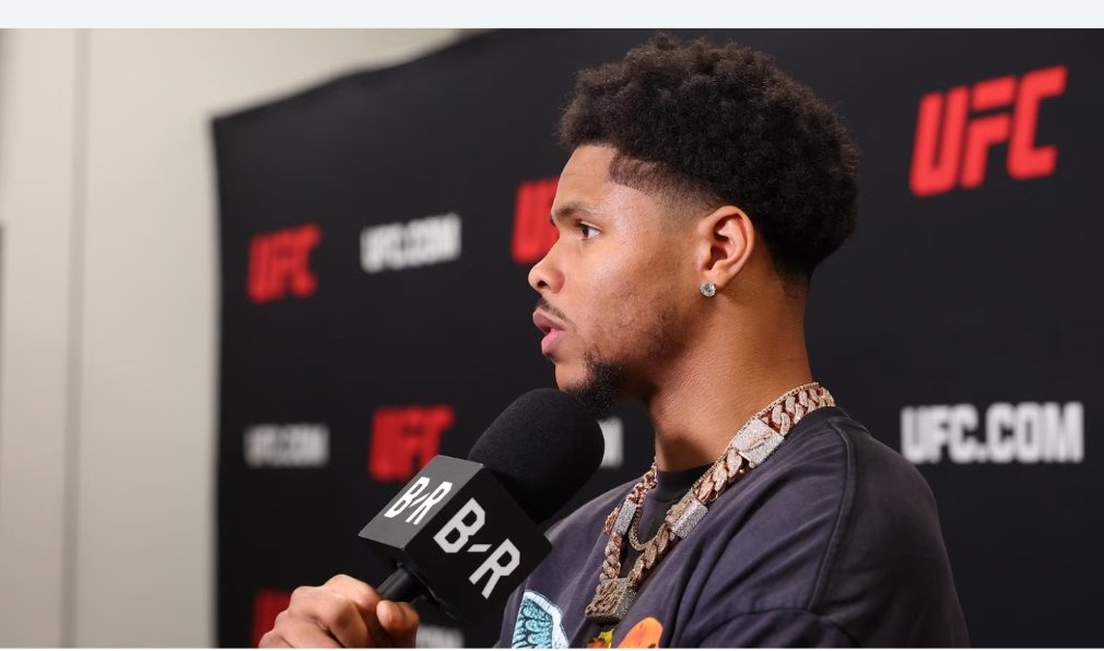 Shakur Stevenson speaks into a microphone at a UFC event