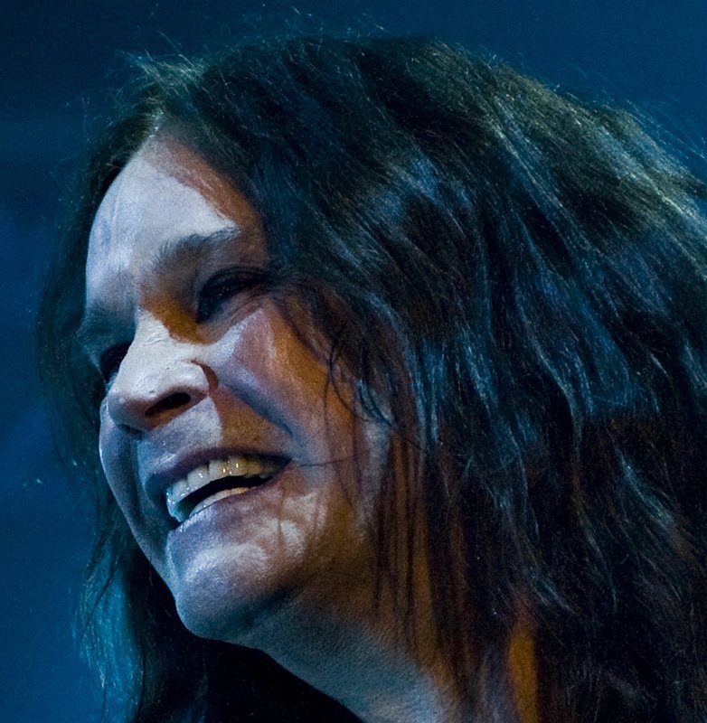 Close-up of Ozzy Osbourne performing on stage