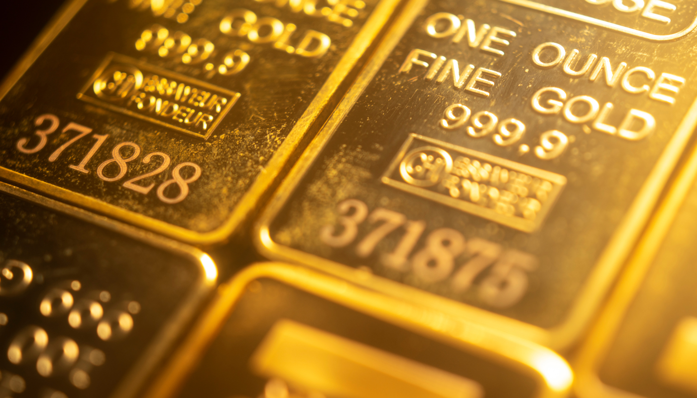 Close-up of one-ounce fine gold bars stamped 999.9