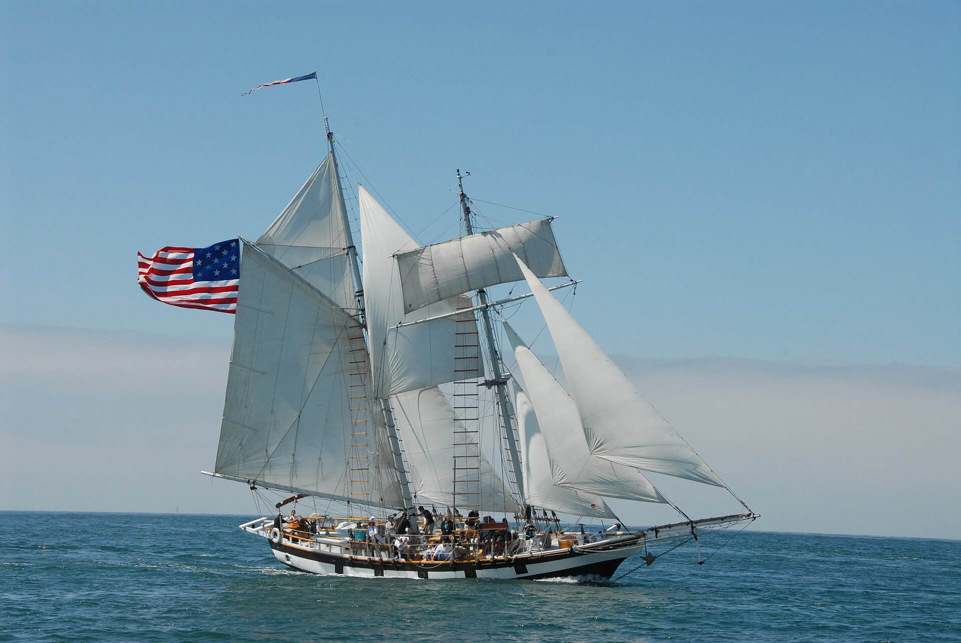 A tall sailing ship under full sail, evoking tonight's Treasure Island series premiere headlining the Sunday TV guide