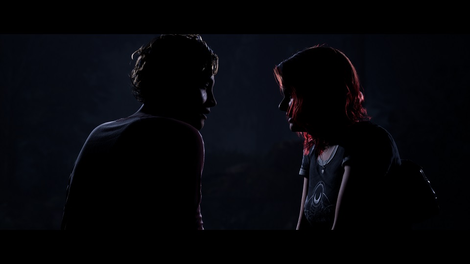 A tense scene from The Quarry, two characters in a dark confrontation