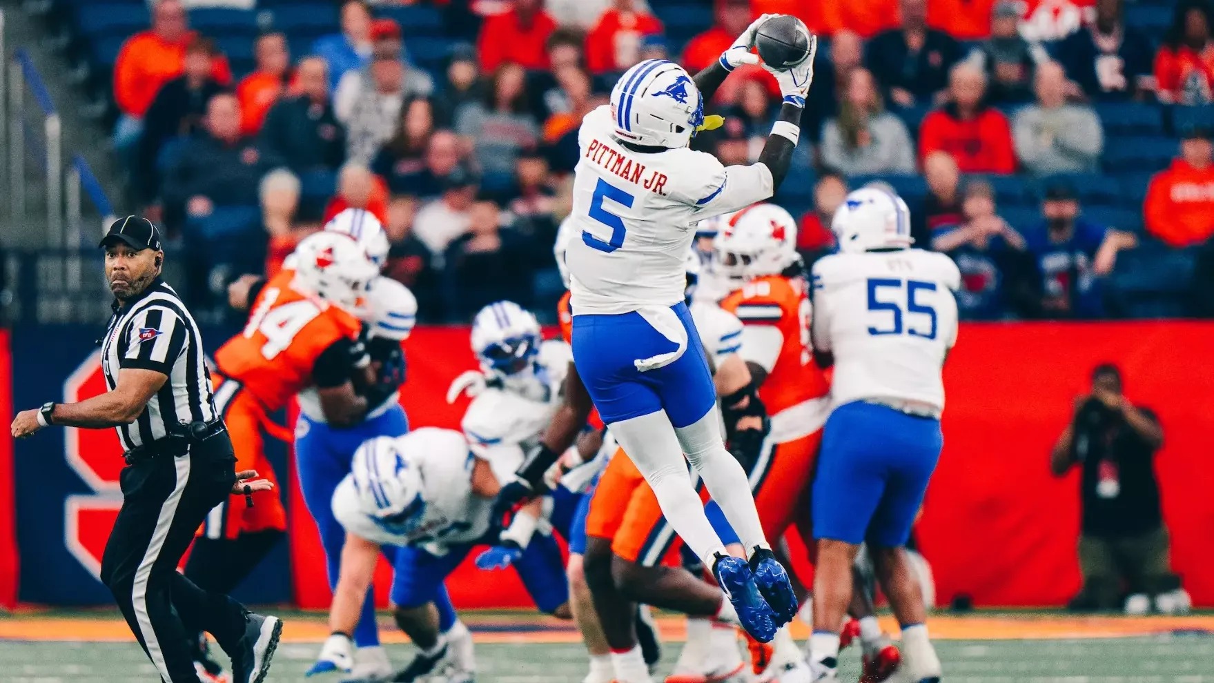 SMU receiver Randy Pittman Jr. leaps to catch a pass against Syracuse at the JMA Wireless Dome