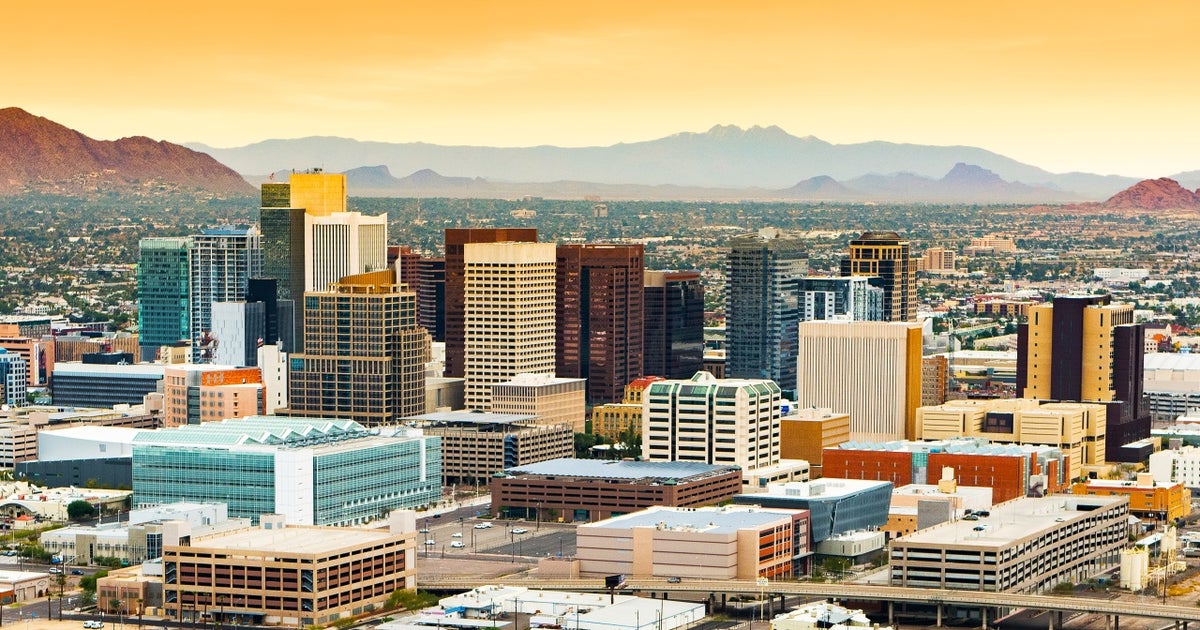 Downtown Phoenix skyline in daylight.
