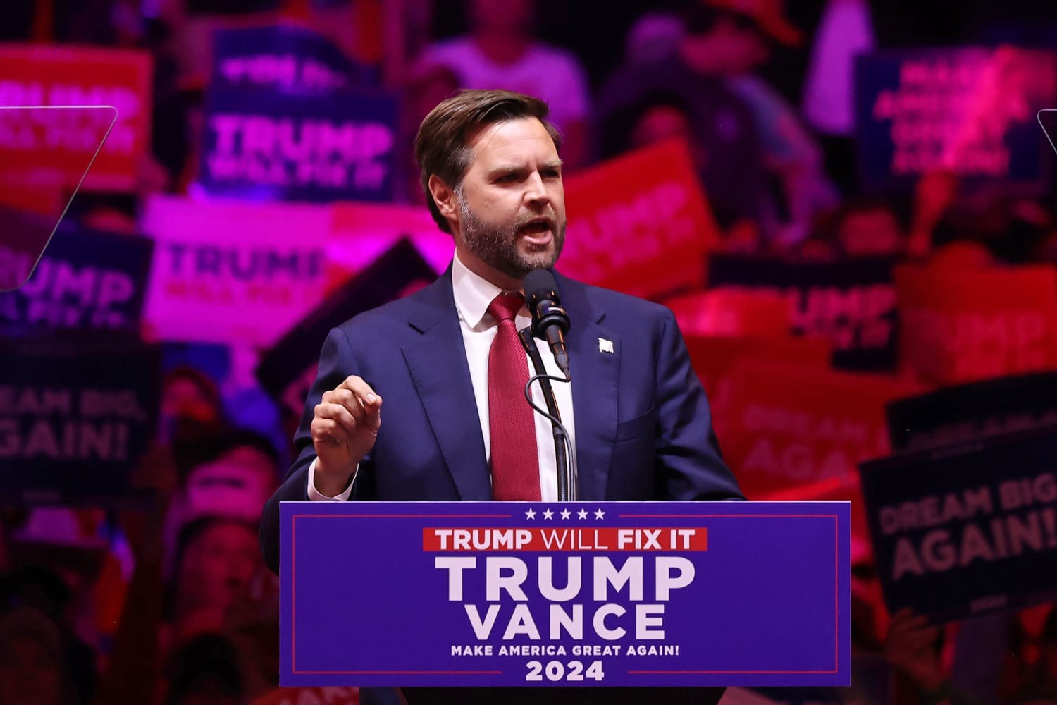 Vice President JD Vance speaking at a Trump Vance 2024 podium