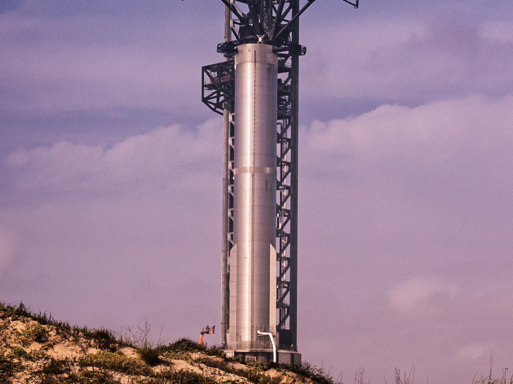 SpaceX Starship stacked on the Super Heavy booster at Starbase, Texas, in bright daylight