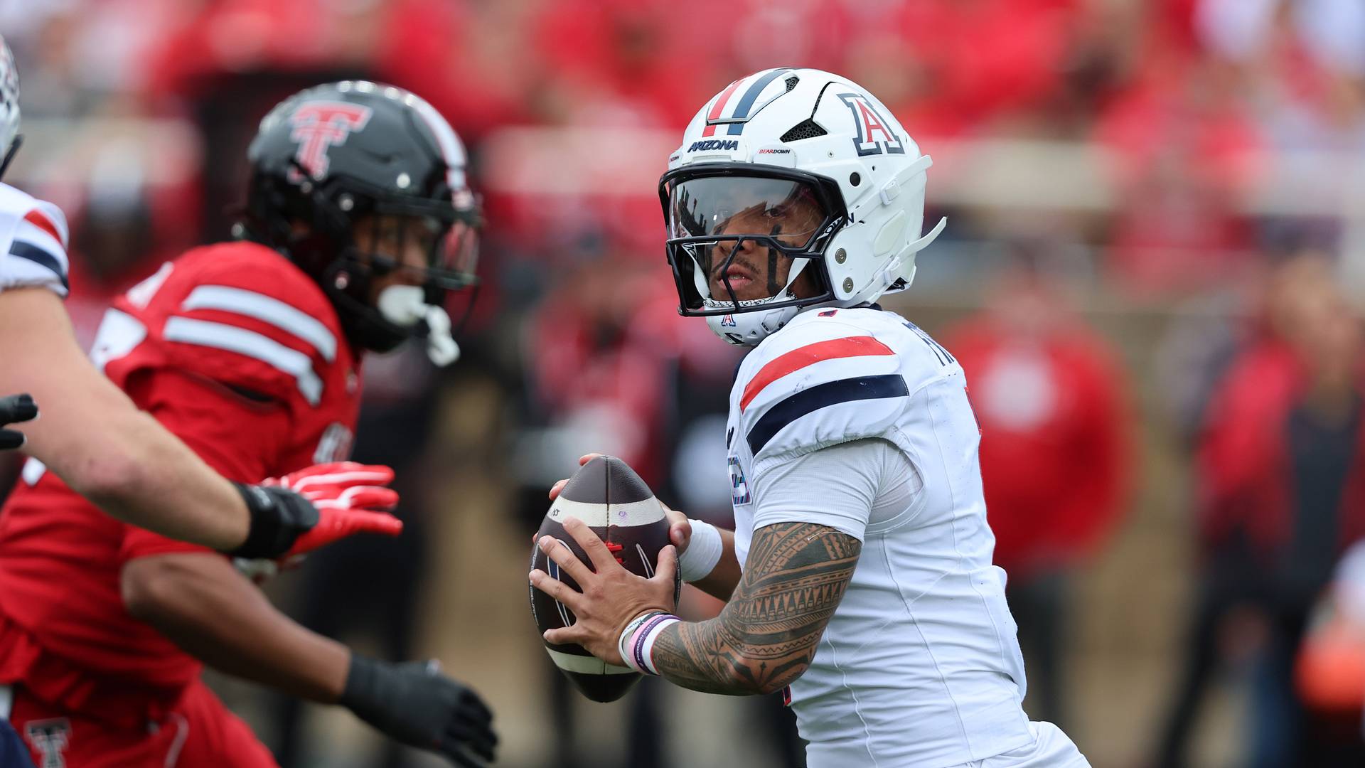 Arizona quarterback Noah Fifita in the pocket against Texas Tech in the first half at Galaxy Stadium