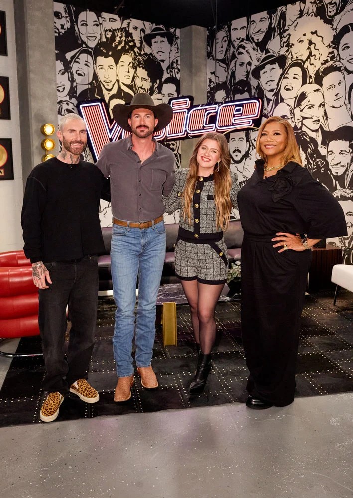 Adam Levine, Riley Green, Kelly Clarkson and Queen Latifah pose together on The Voice set for Season 30.