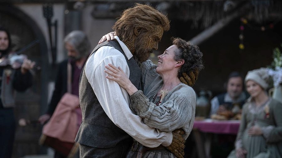 Olivia Colman dances with the wicker husband, played by Alexander Skarsgård, in Wicker.