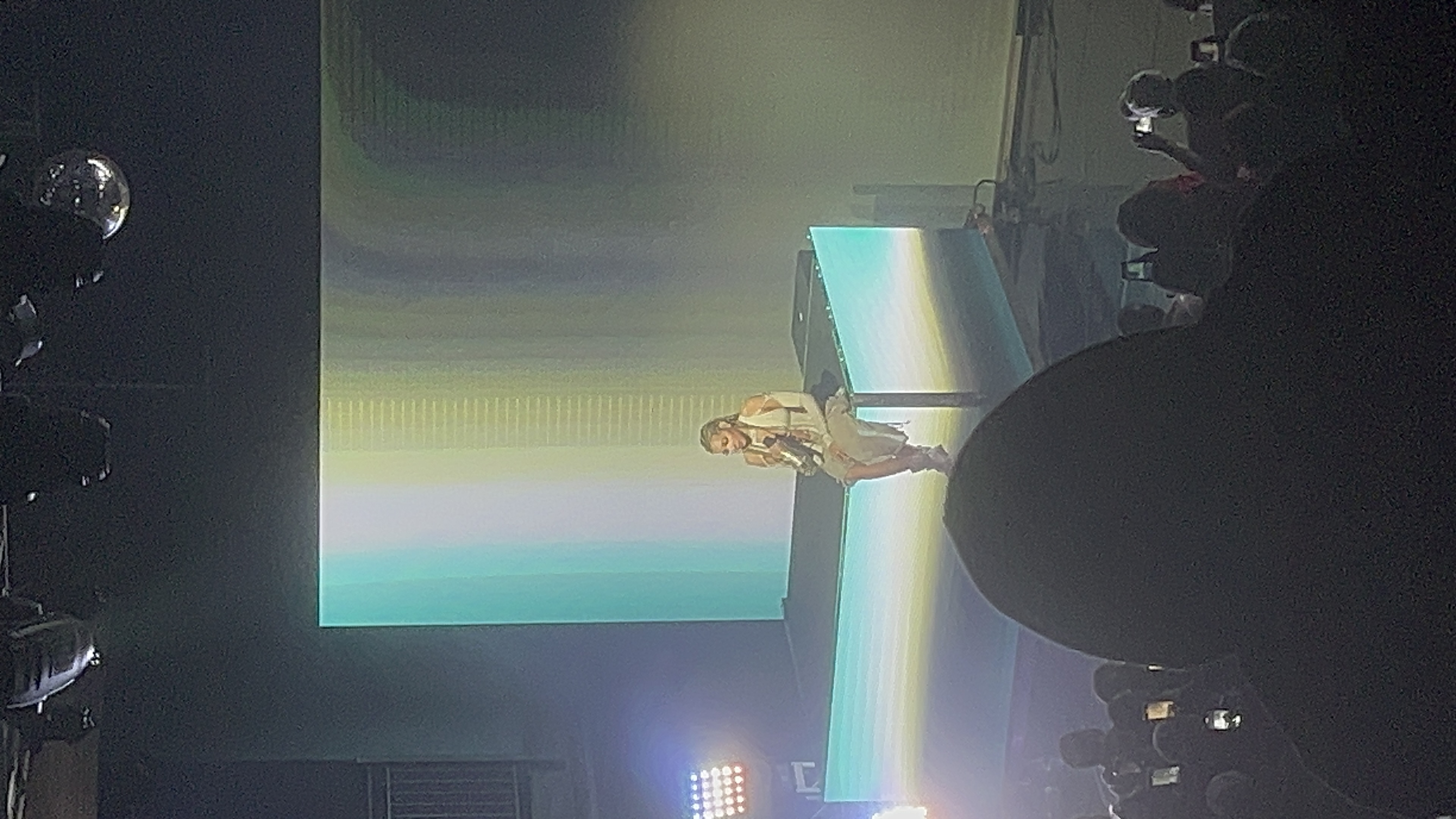 Tinashe performing live on stage in 2024