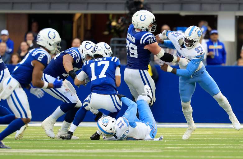 Daniel Jones is sacked by Jermaine Johnson of the Tennessee Titans during the fourth quarter at Lucas Oil Stadium on October 18, 2026