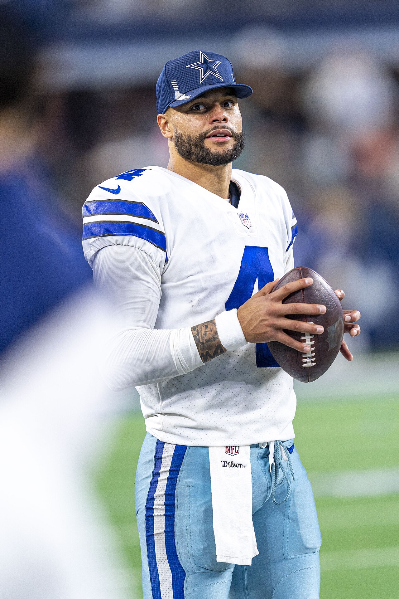 Dak Prescott of the Dallas Cowboys holding the ball at AT&T Stadium