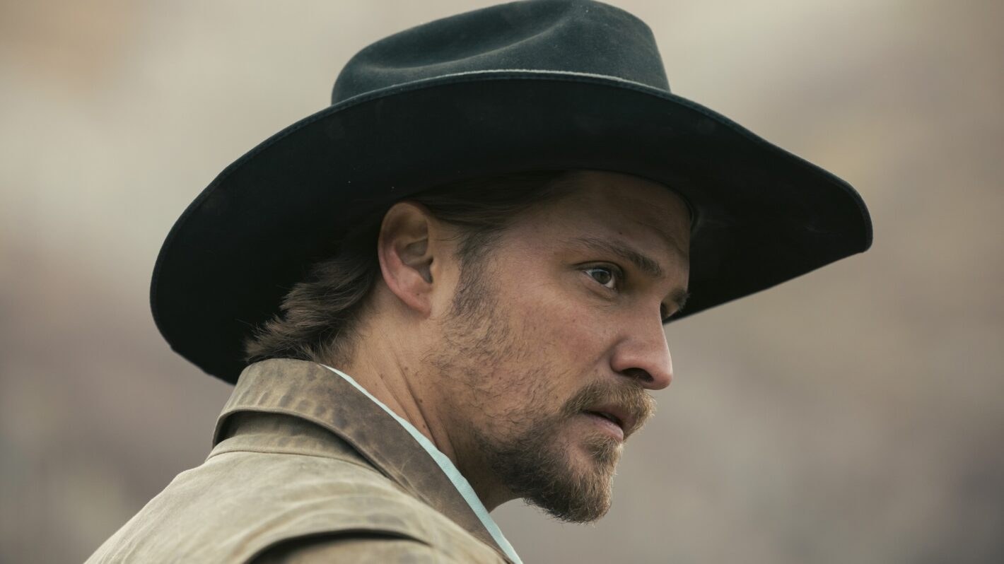 Luke Grimes as Kayce Dutton in a cowboy hat