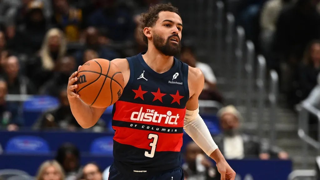 Trae Young in the Washington Wizards' The District jersey.