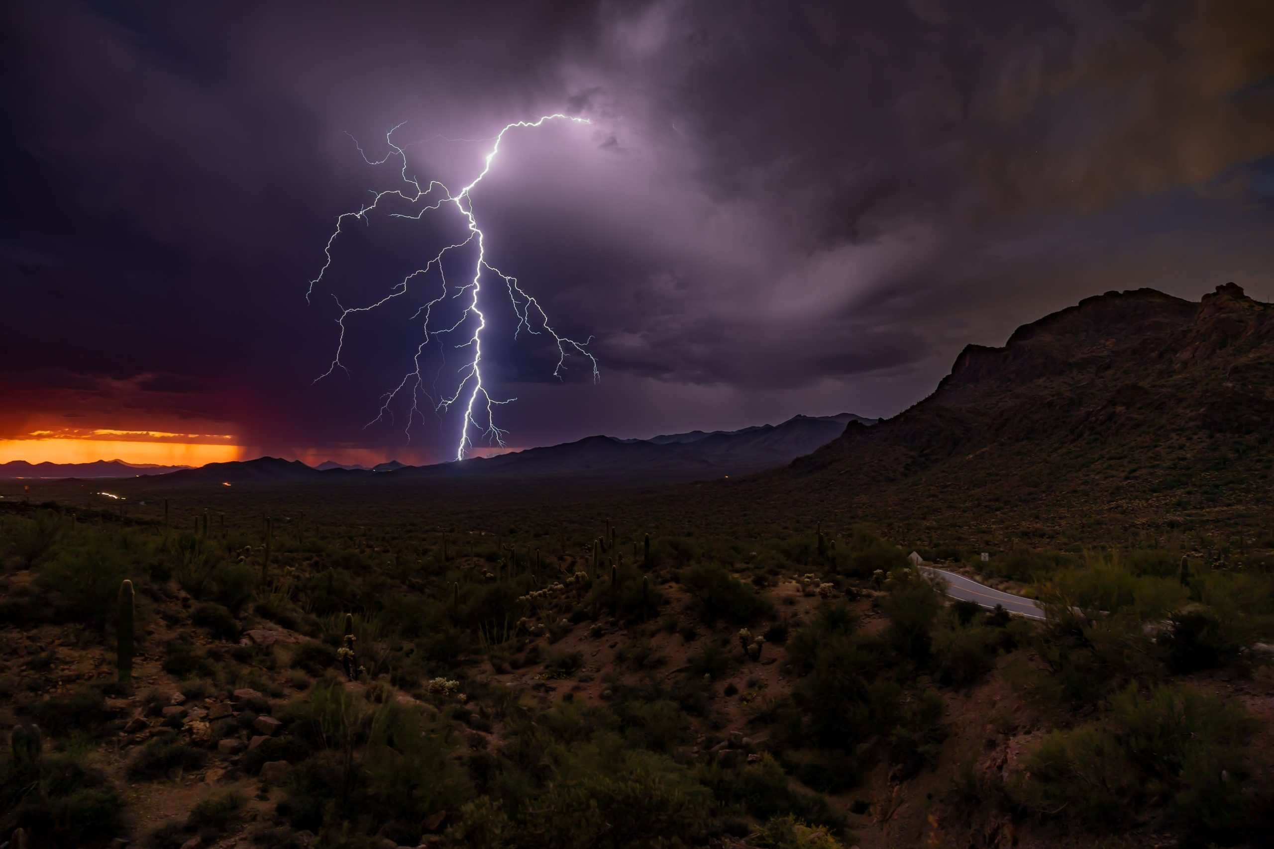 Lightning over the desert at dusk
