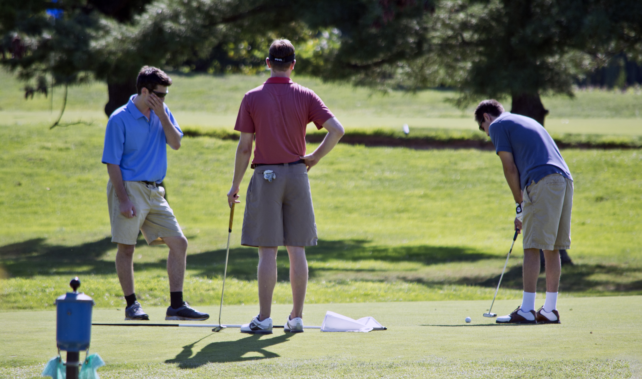 Golfers putting on the Red Course at East Potomac Golf Course, file photo