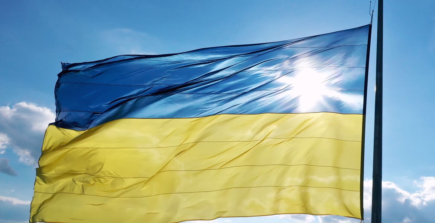 The Ukrainian flag waving in bright daylight