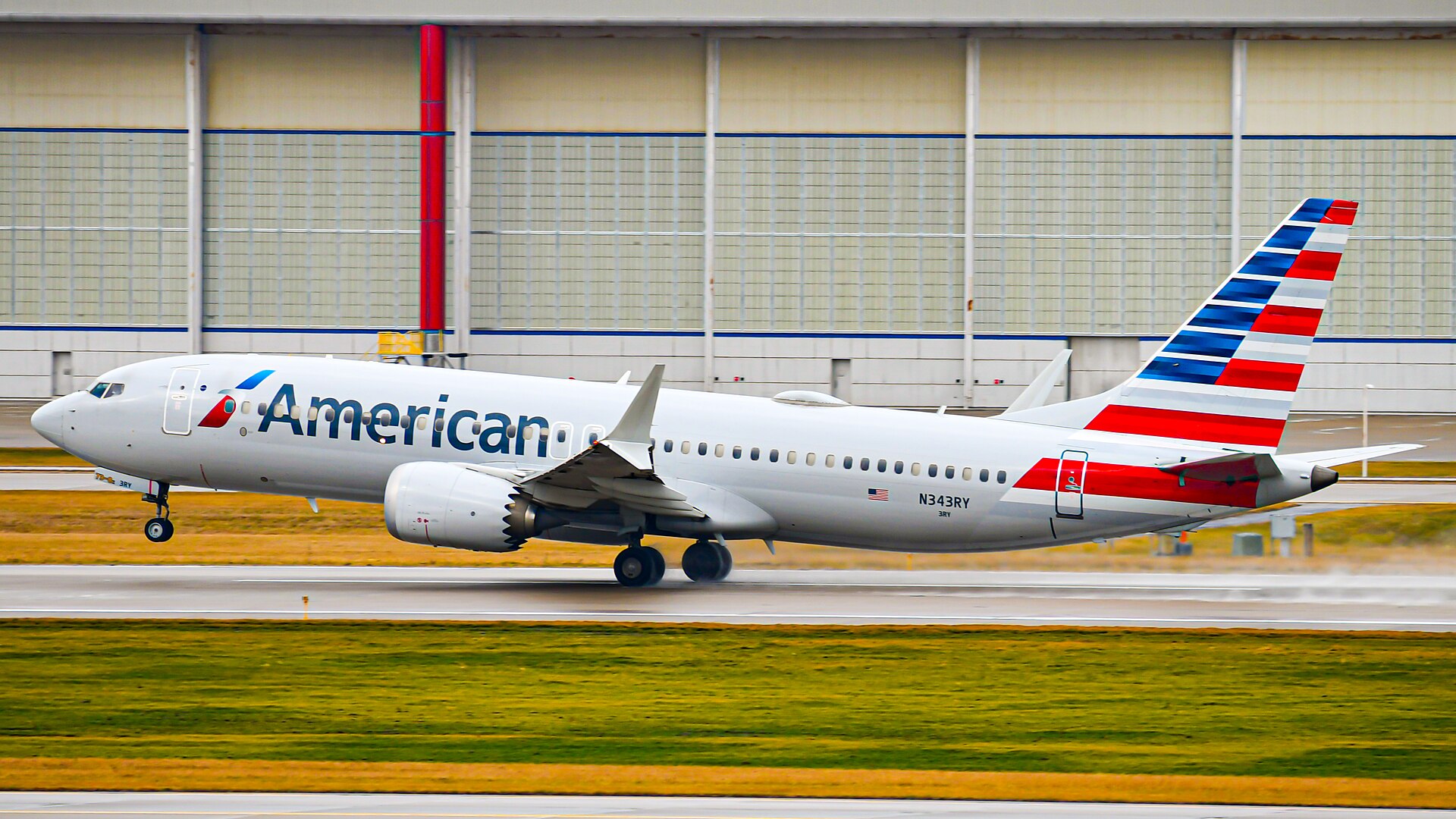 An American Airlines aircraft at an airport gate
