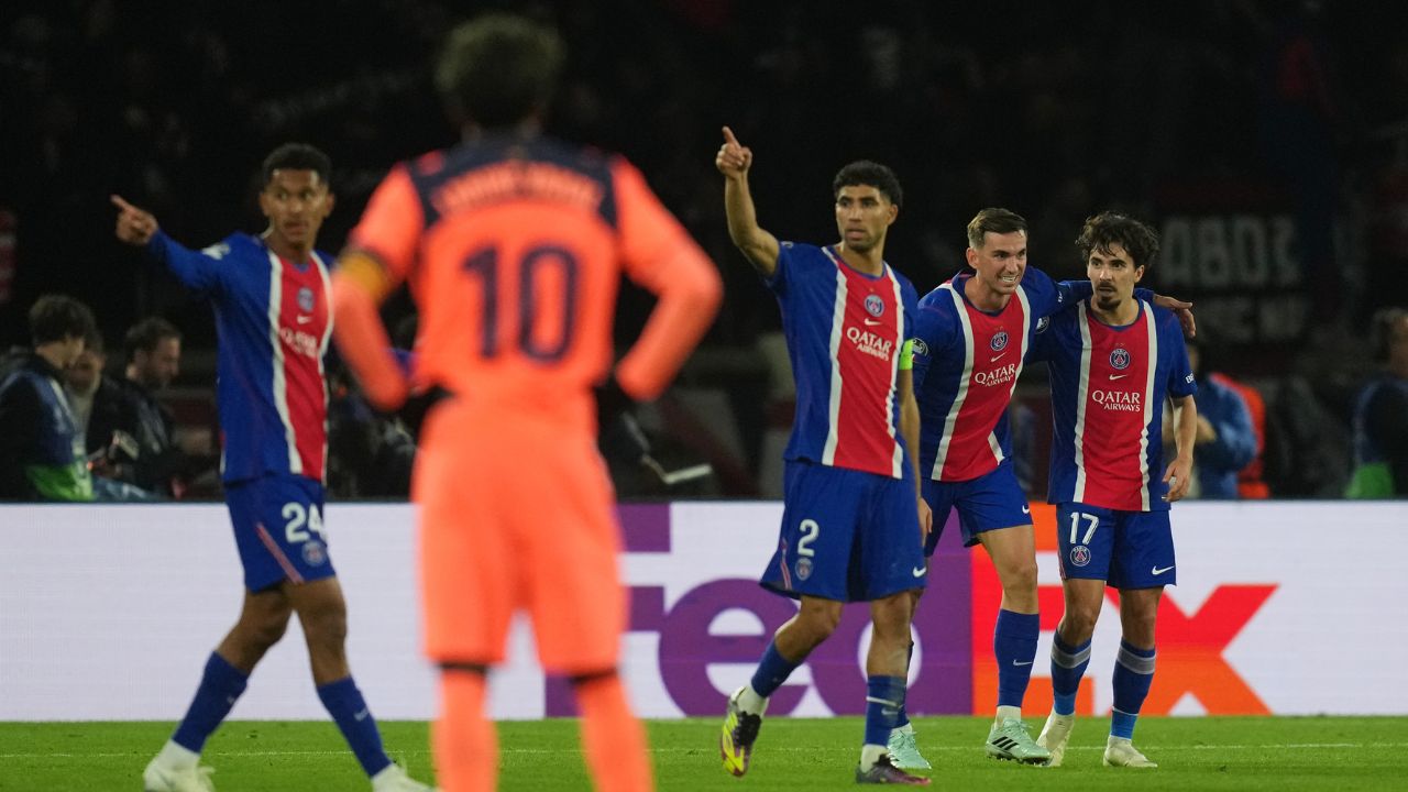 Fabian Ruiz celebrates scoring Paris Saint-Germain's fourth goal against Barcelona at the Parc des Princes, with Achraf Hakimi and Vitinha alongside him