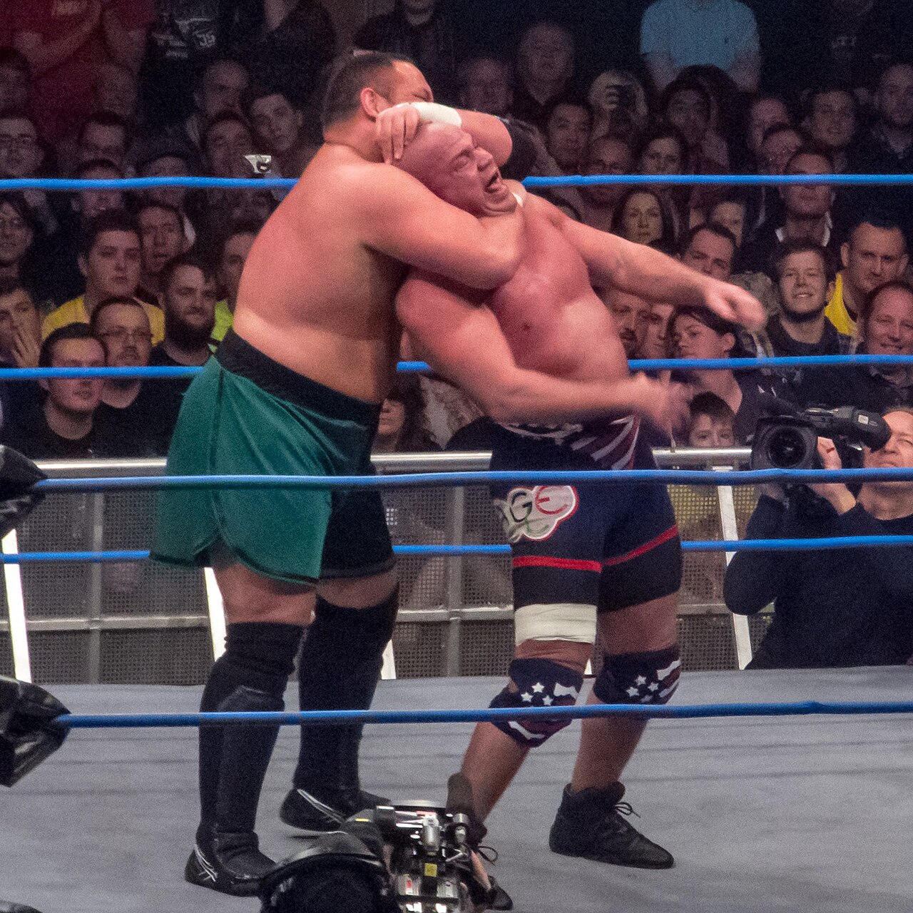 Samoa Joe applies a rear-naked choke to Kurt Angle (file photo)
