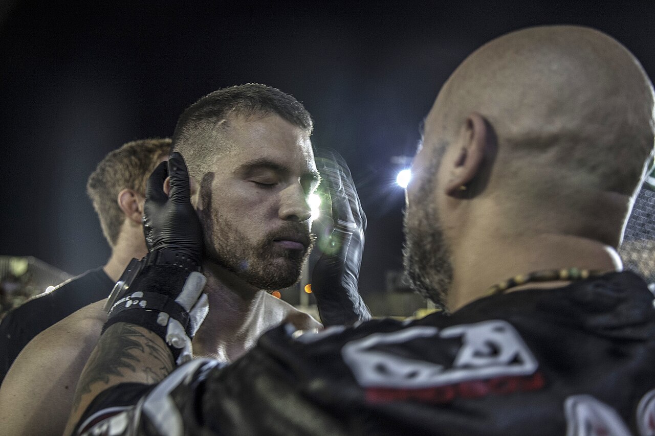 A ringside doctor checks a fighter after a bout (file photo)