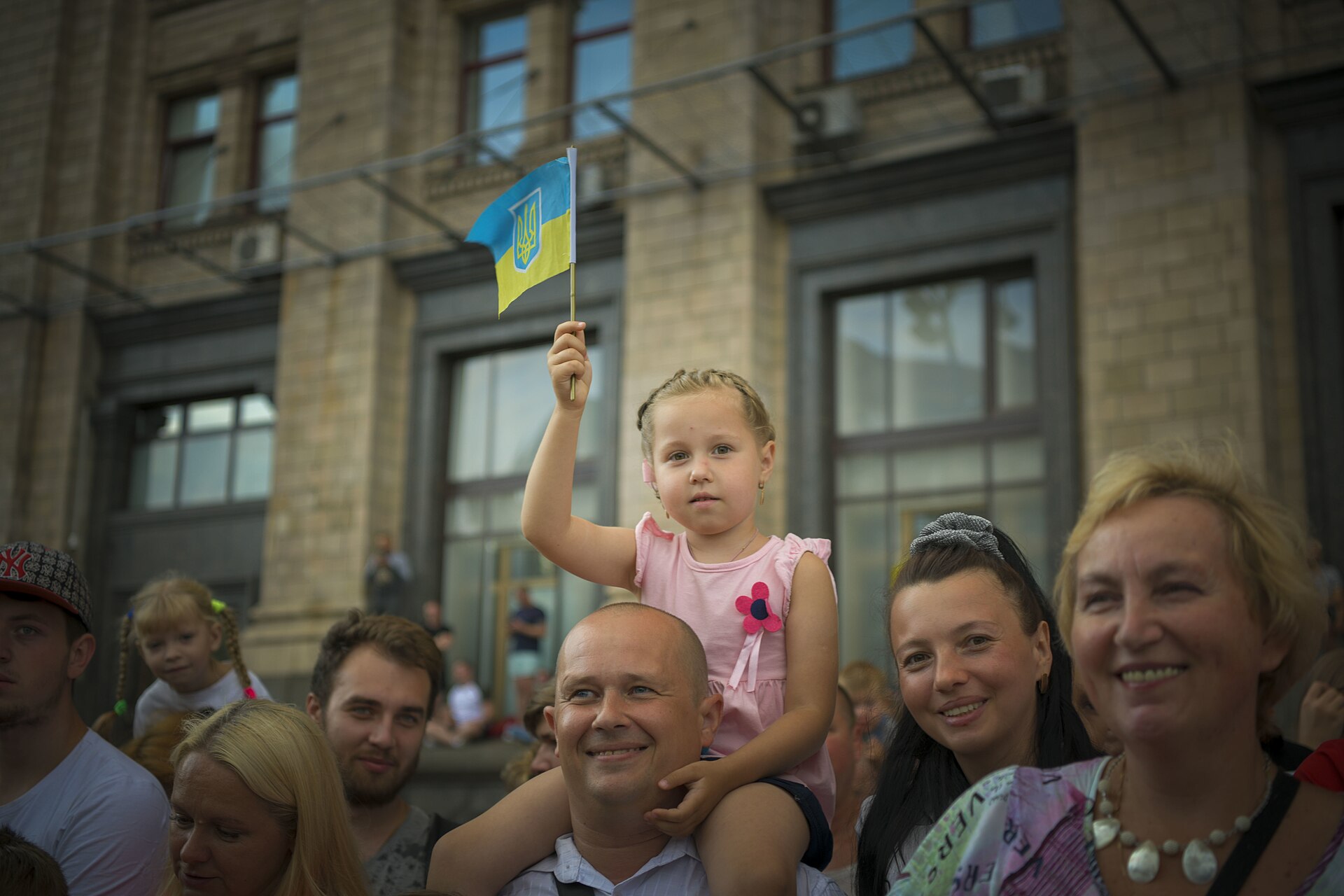 A child waves the Ukrainian flag during Independence Day parade rehearsals in Kyiv.