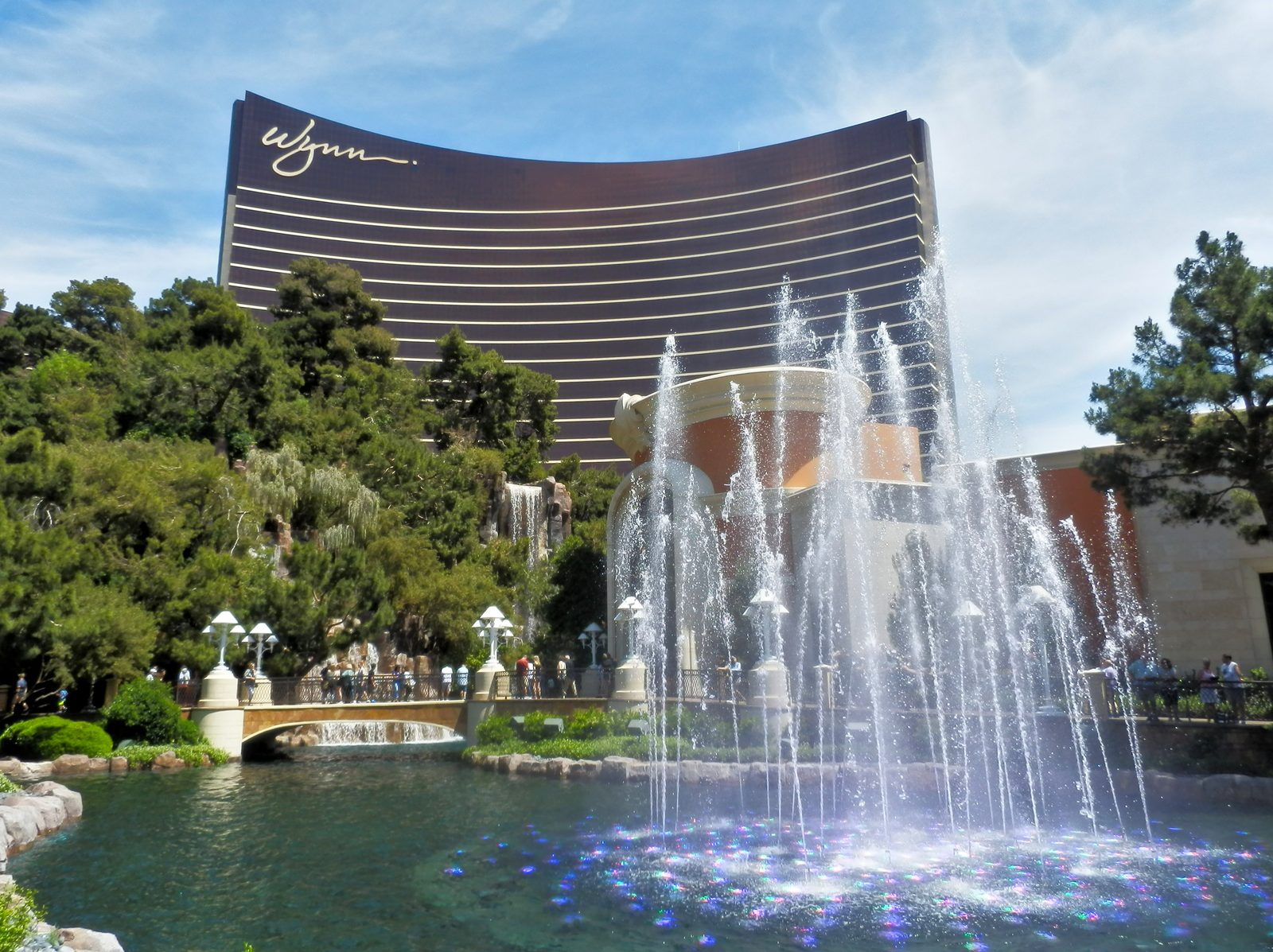The Wynn Las Vegas resort towers on a bright day.