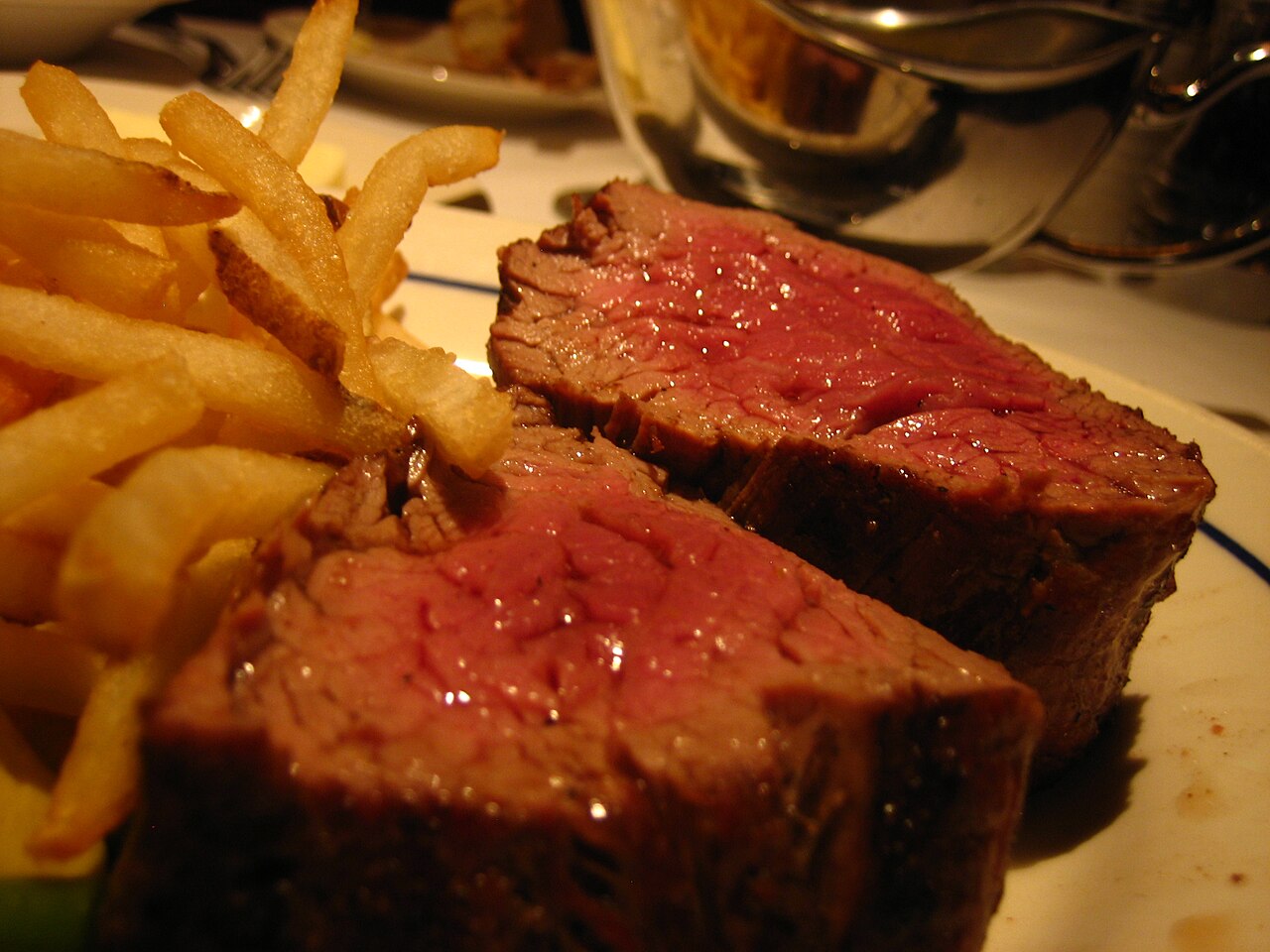 A precisely cut steak dinner, the centerpiece of October's steakhouse wave