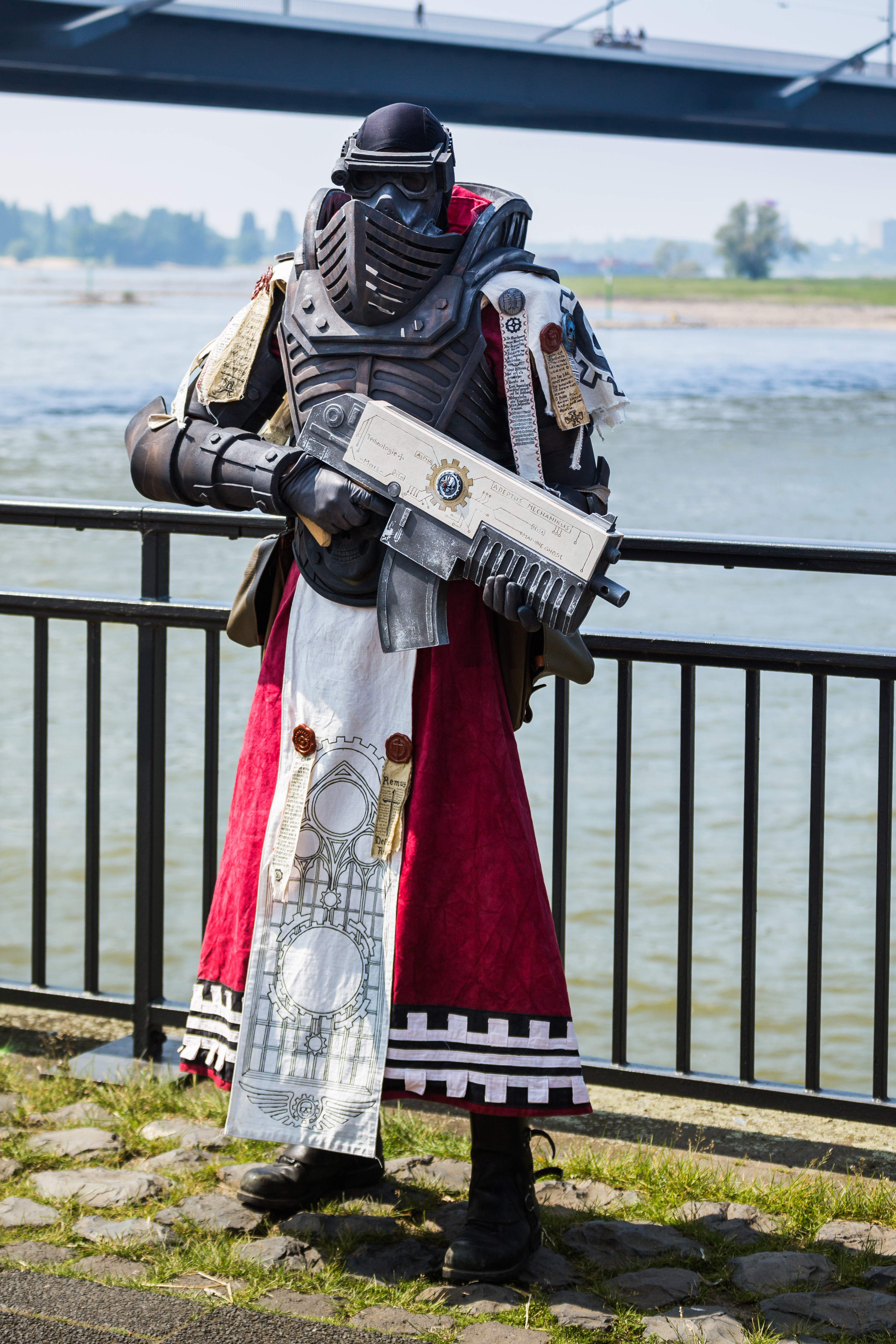 A Warhammer 40,000 cosplayer in Inquisition armor at a fan convention