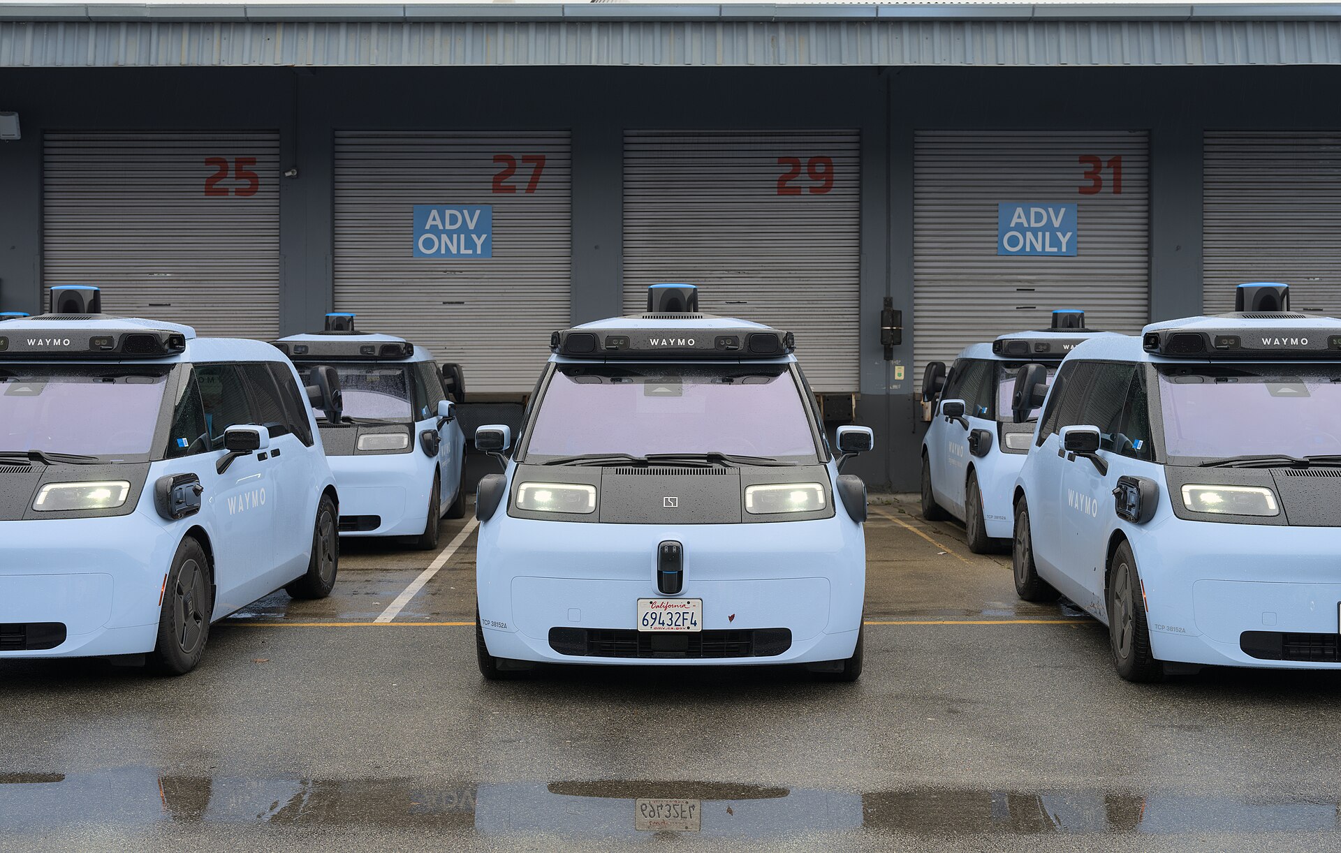 A Waymo driverless vehicle in bright daylight