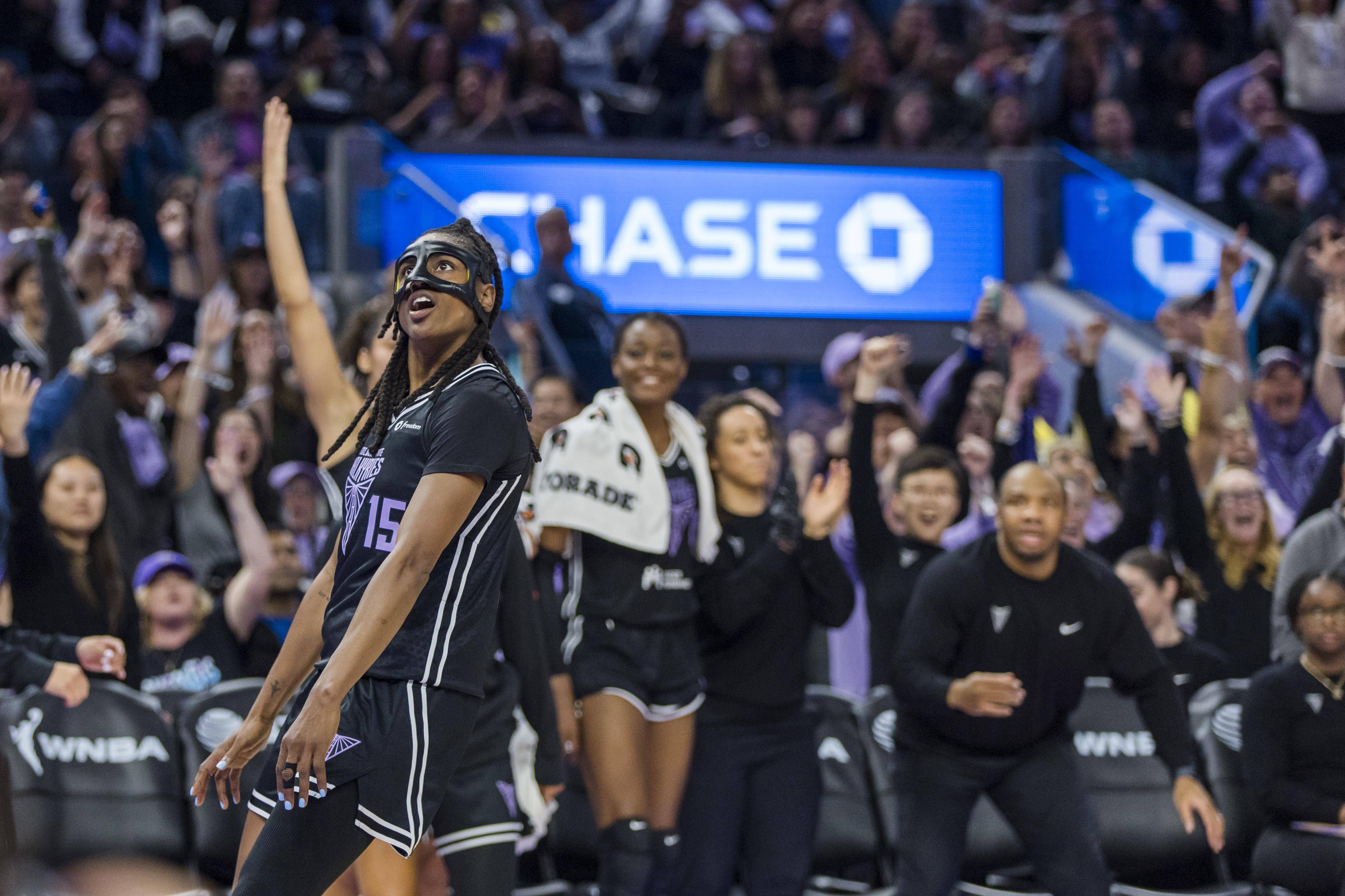 Golden State Valkyries fans celebrate at Chase Center during the WNBA playoffs